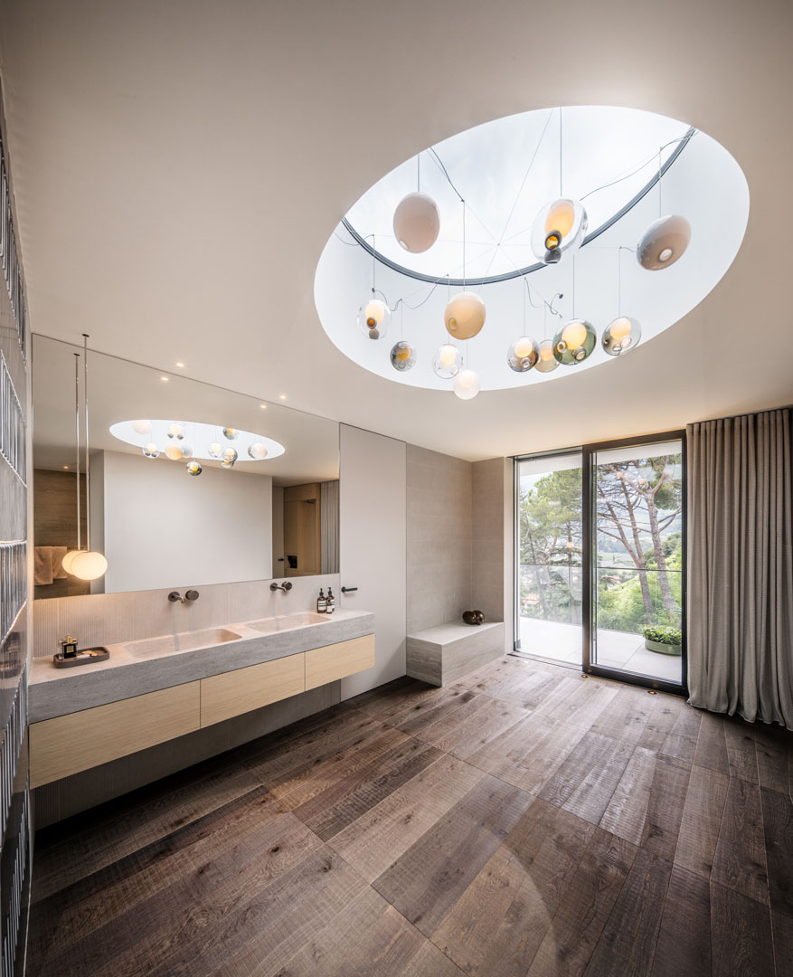 An hardwood flooring for a loft with a view of the Adige Valley