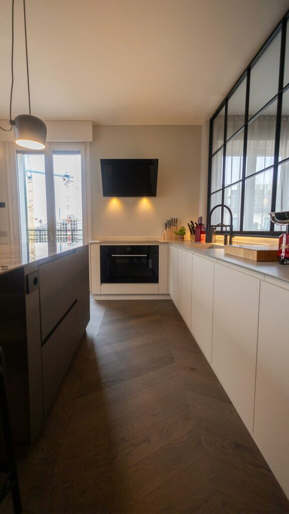 penthouse with a view of City Life and dark parquet flooring in the kitchen