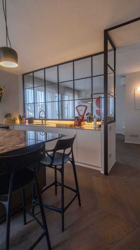 penthouse with a view of City Life and dark parquet flooring in the kitchen