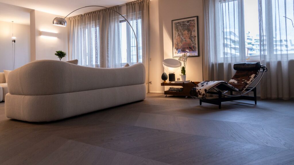 penthouse with a view of City Life and dark parquet flooring in the living room